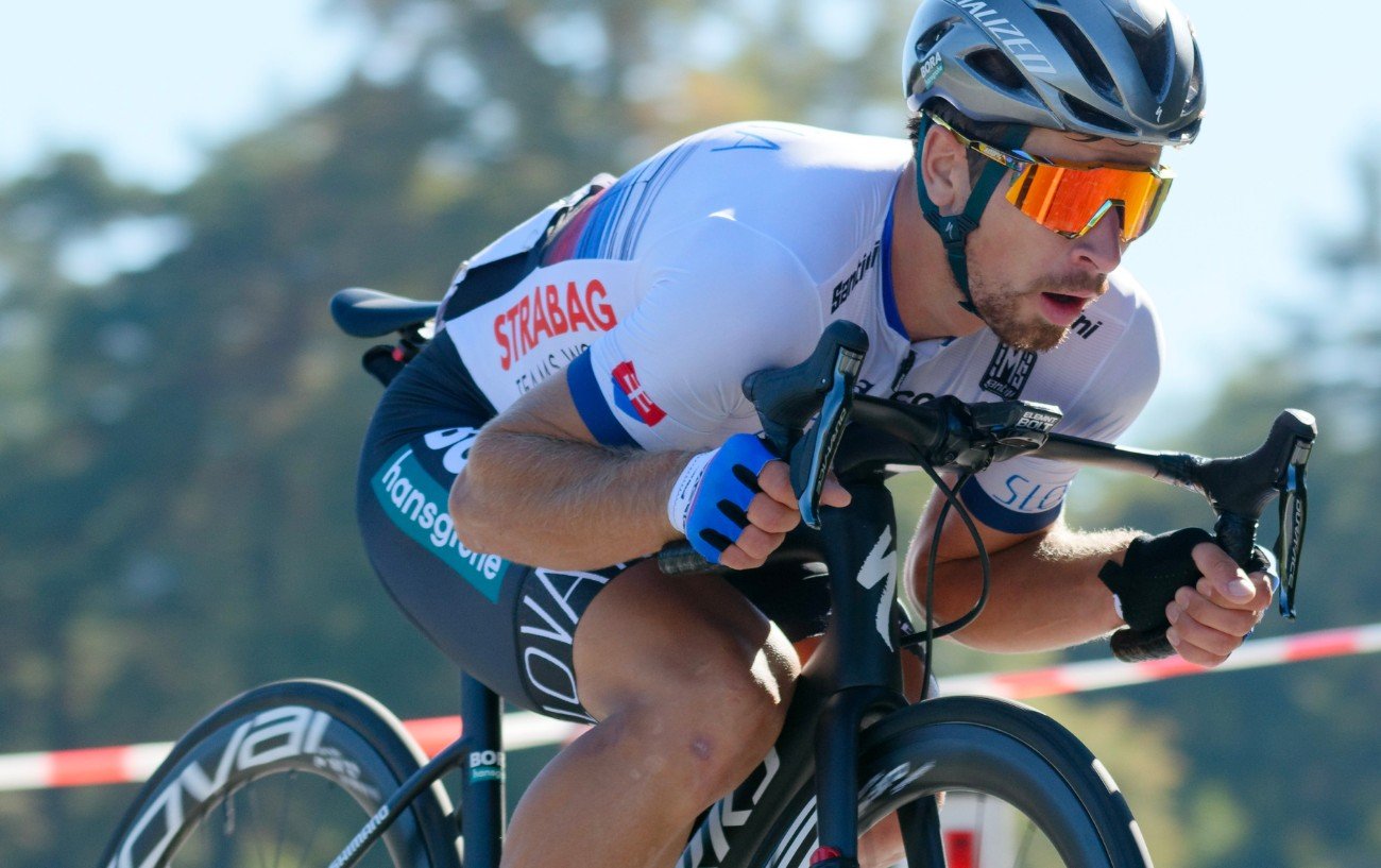 Peter Sagan in a supertuck position on his road bike.