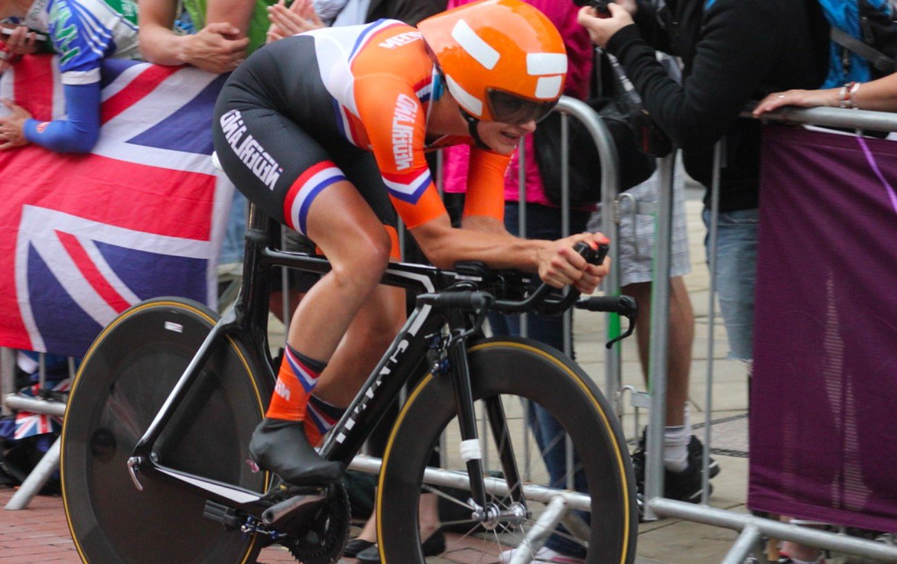Marianne Vos rides a time-trial bike.