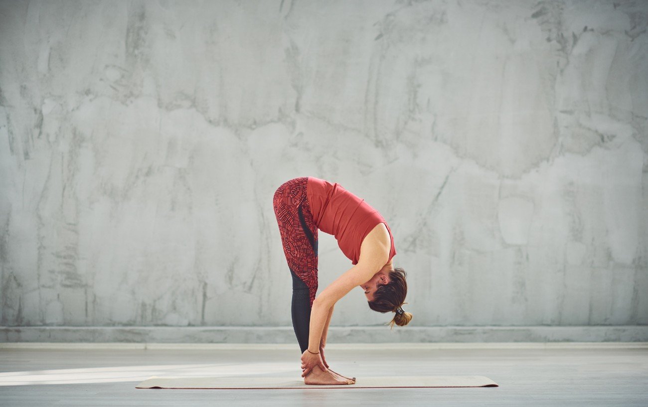forward fold crossed legs