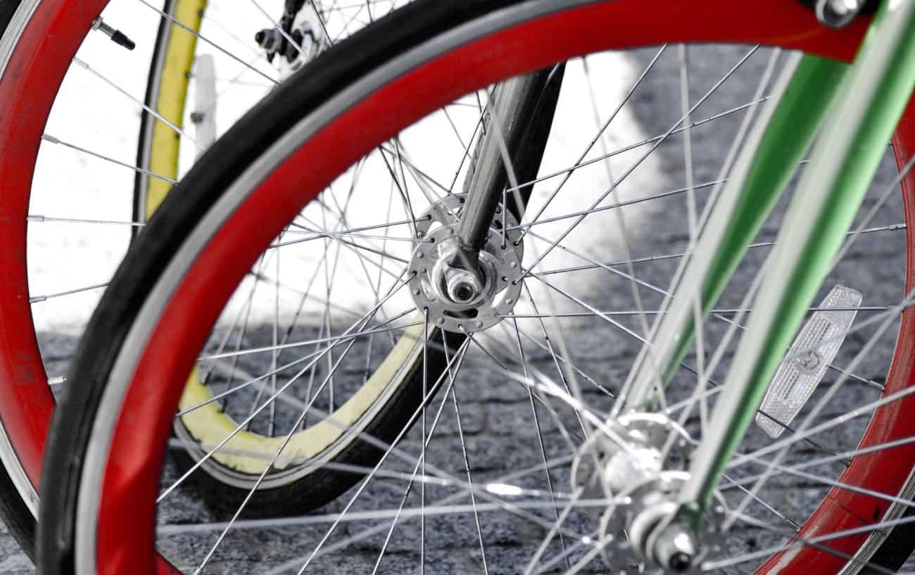 Three deep-rimmed road bike wheels side-by-side.