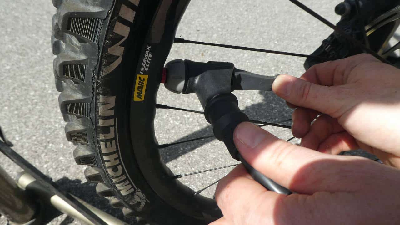 Attaching a pump to a bike tire