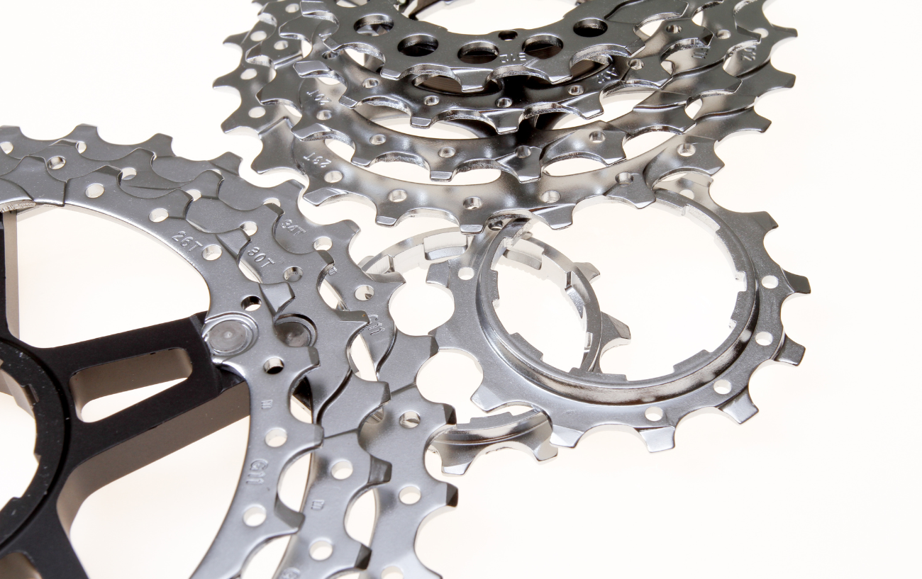 Disconnected sprockets from a bike cassette.
