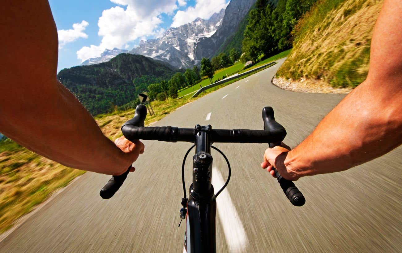 Cyclist's POV of a ride through a mountainous valley.