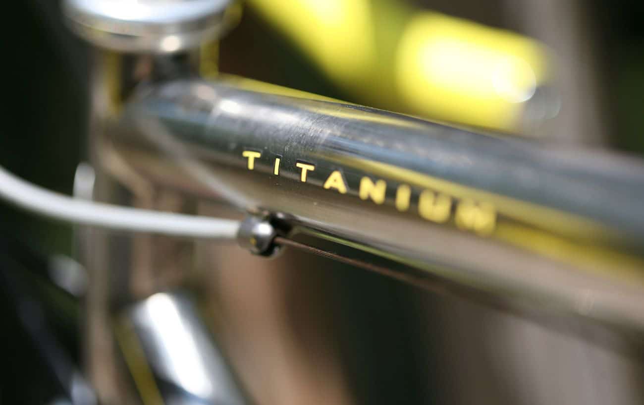 Close-up of a titanium bike frame.