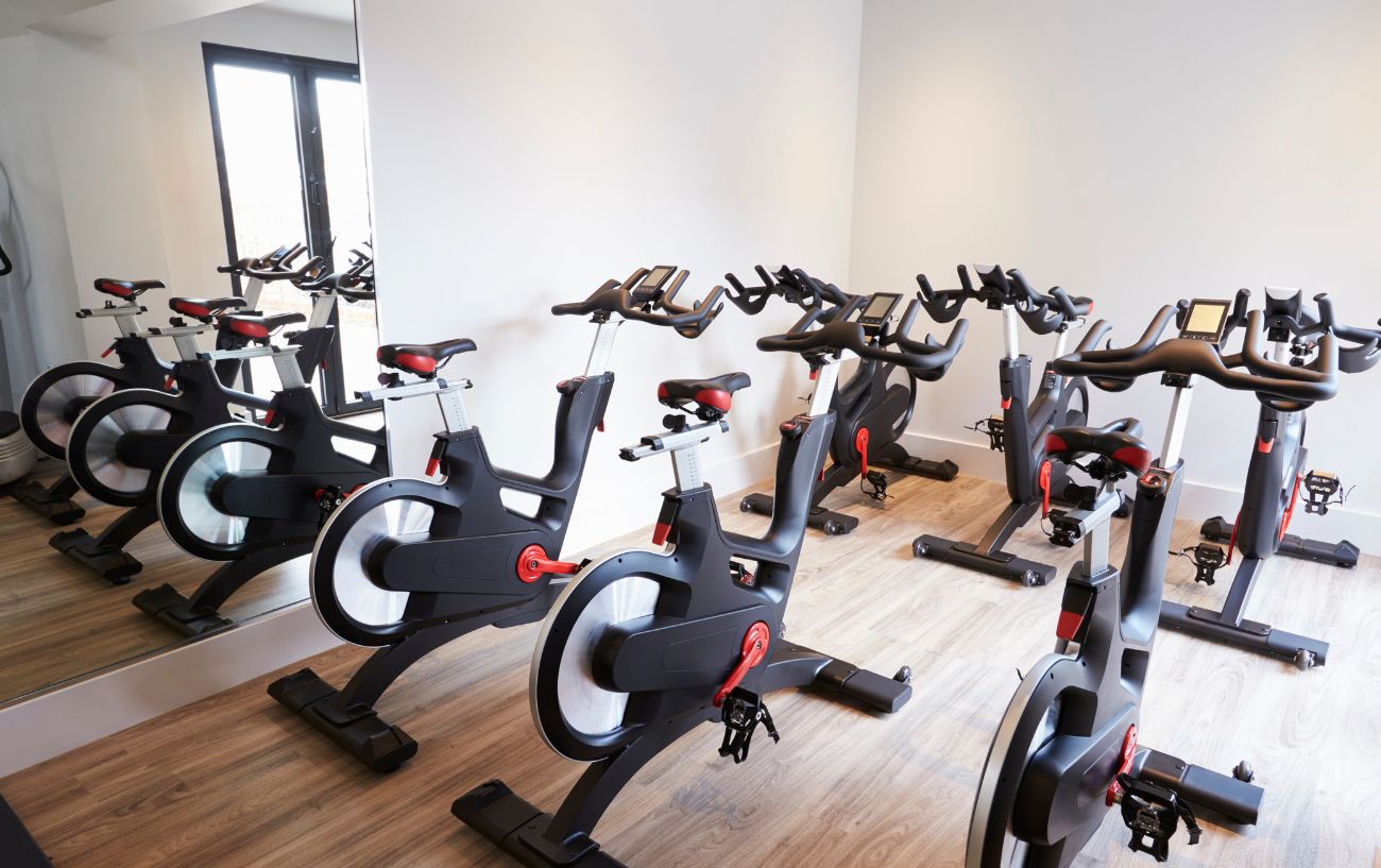 A light and airy studio filled with spin bikes.