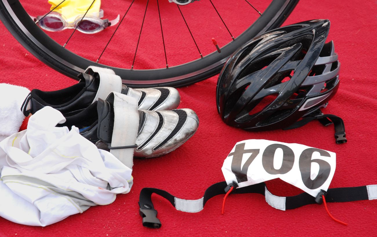 A duathlete's equipment laid out in the transition zone.