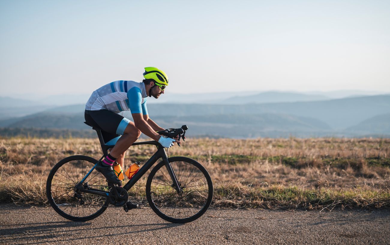 A cyclist tracks his HRV while cycling along a flat road.