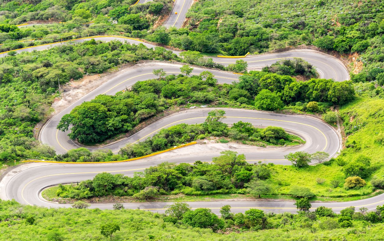 A series of hairpin bends snaking through the jungle.