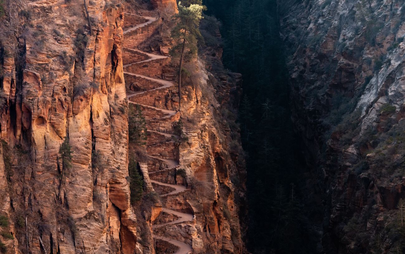 A series of switchbacks down a rocky cliff face.