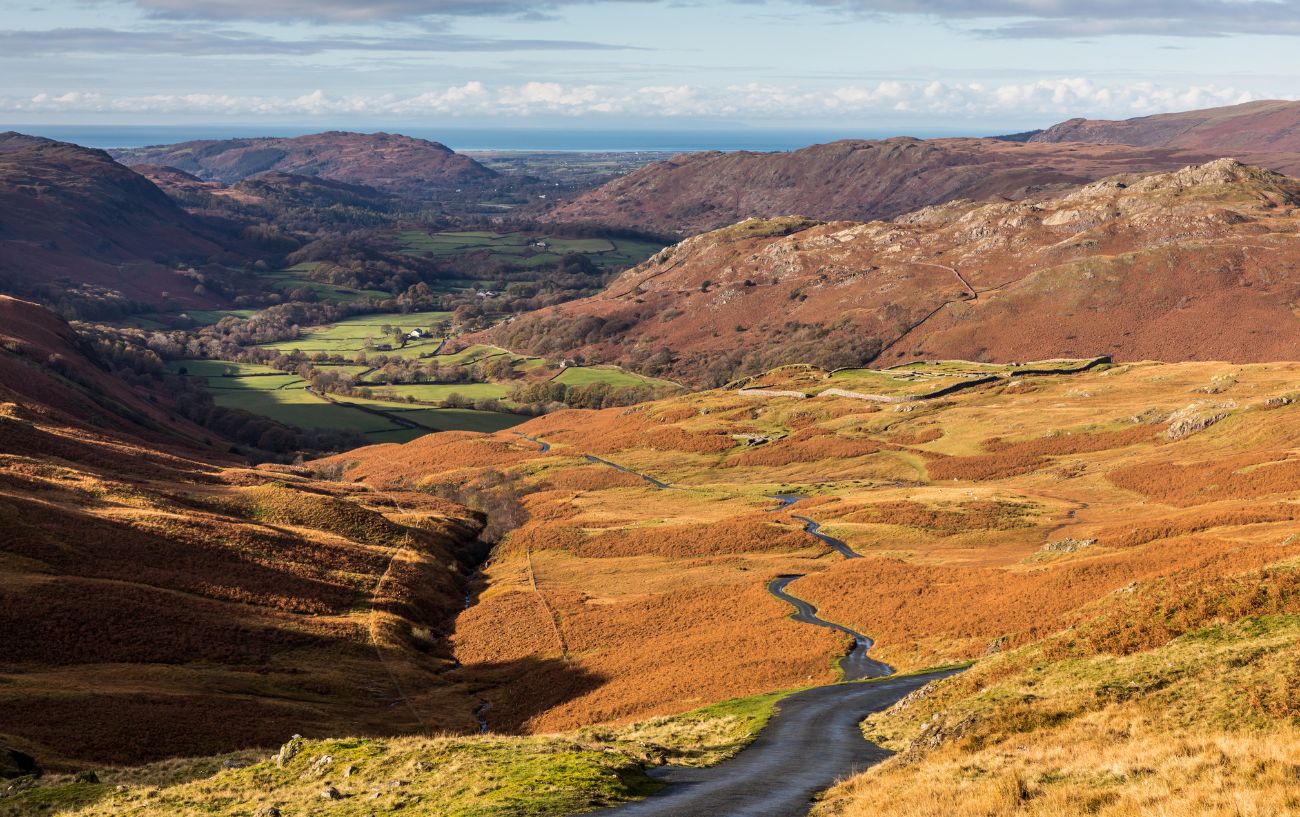 Autumnal view over the Hardknott Pass cycle route looking towards the west.