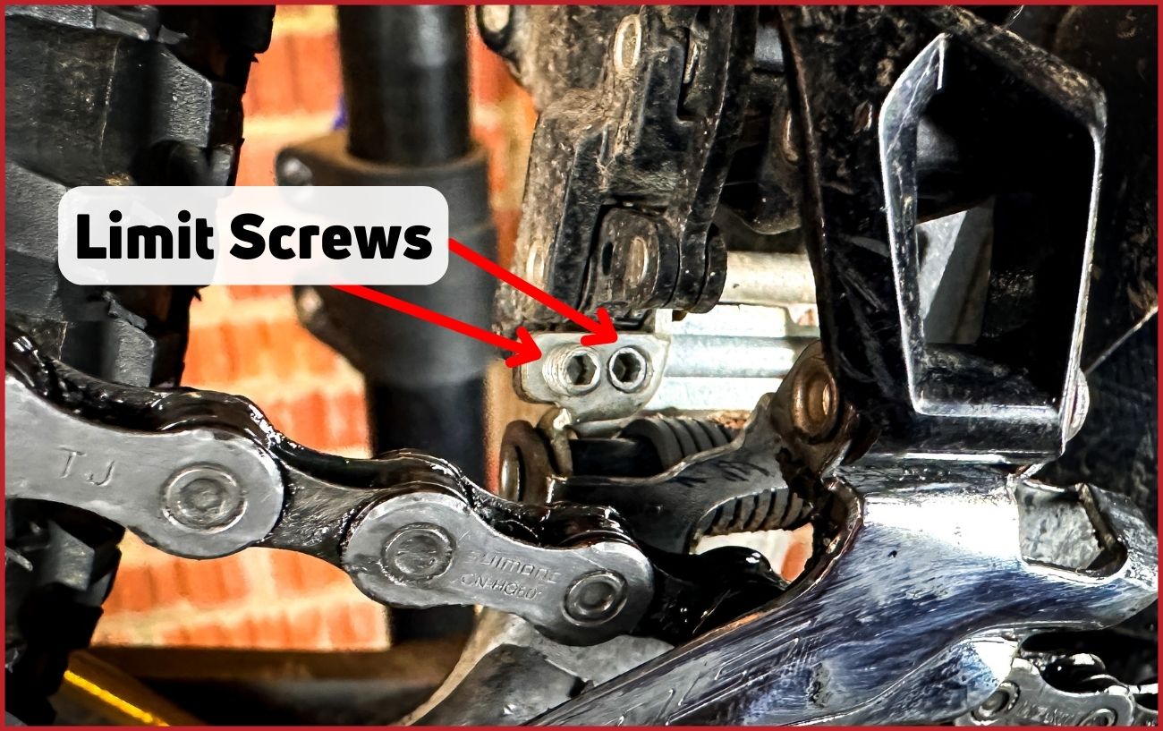Diagram showing the limit screws on the front derailleur.