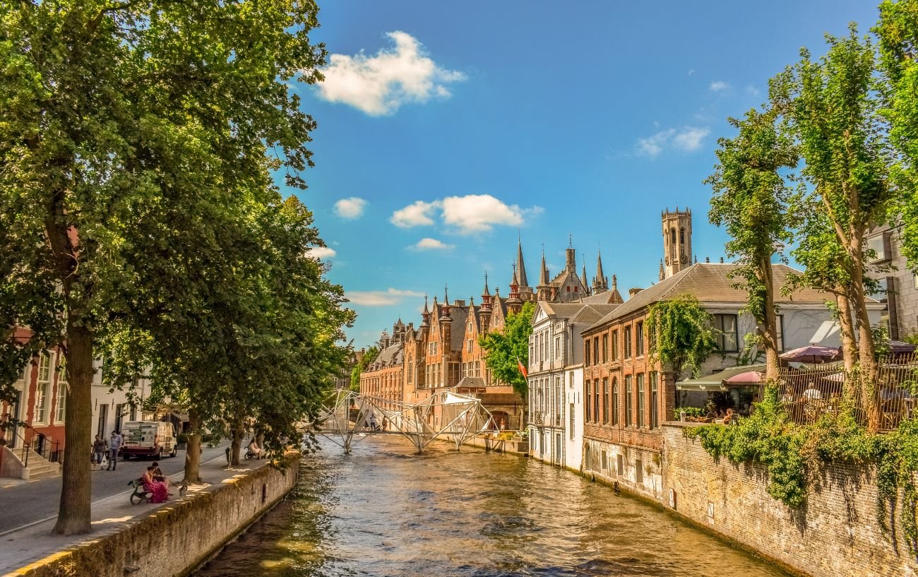 Photo of a canal in Belgium on a summer's day.