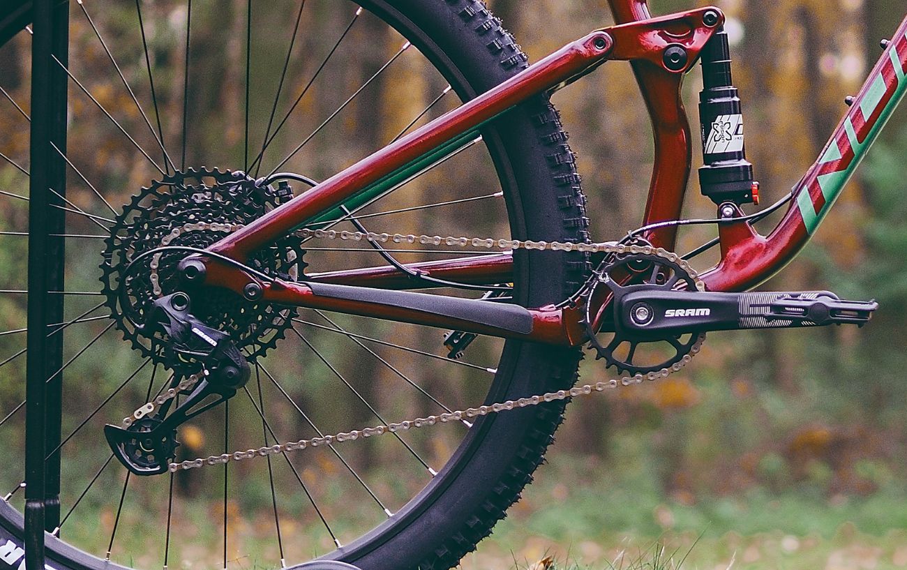 Close-up of a mountain bike drivetrain with a "dinner plate" granny gear.