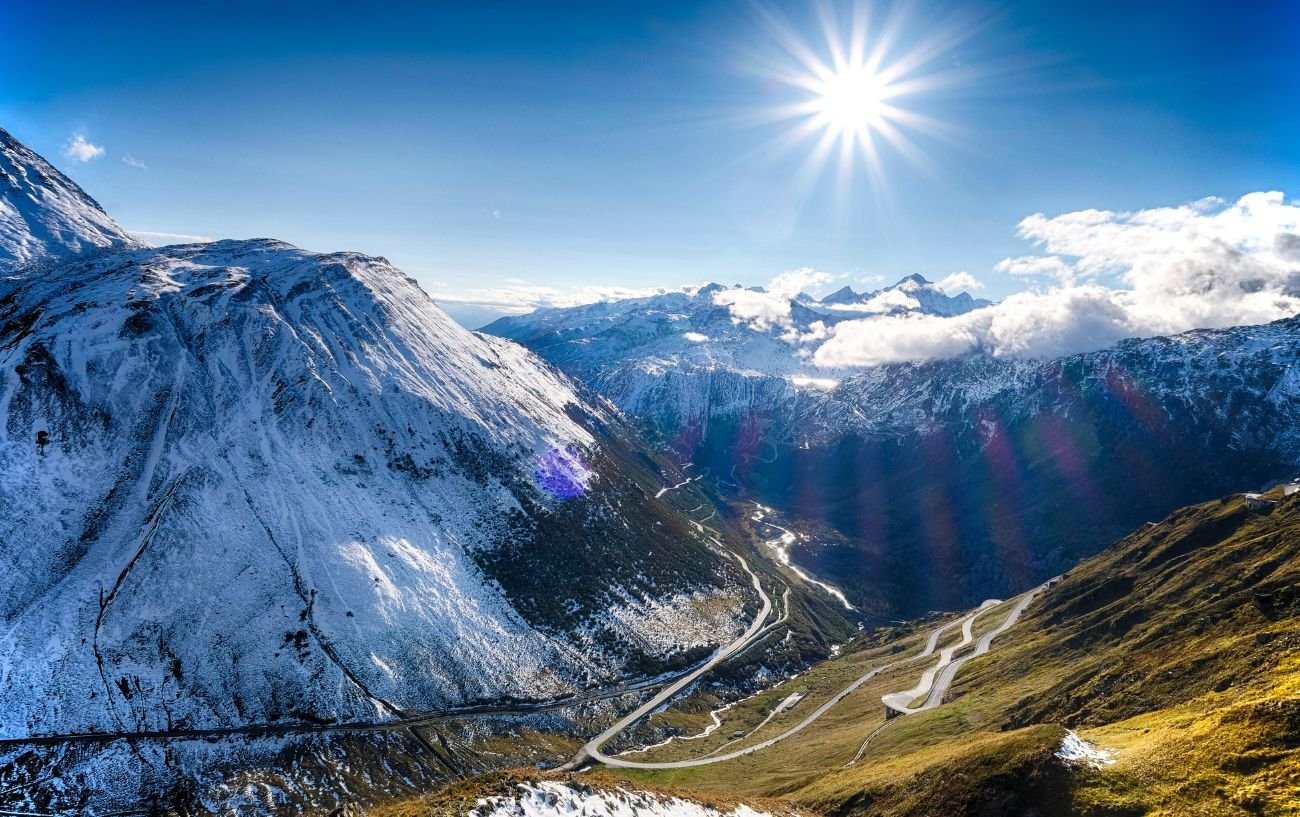 Panoramic view of the Furka Pass as winter turns to spring.