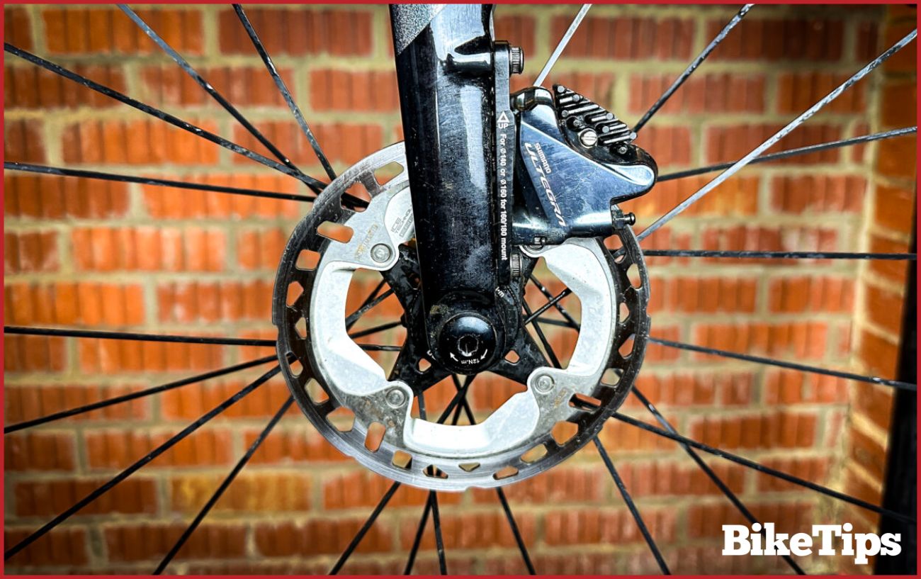 Close-up of a black disc brake.