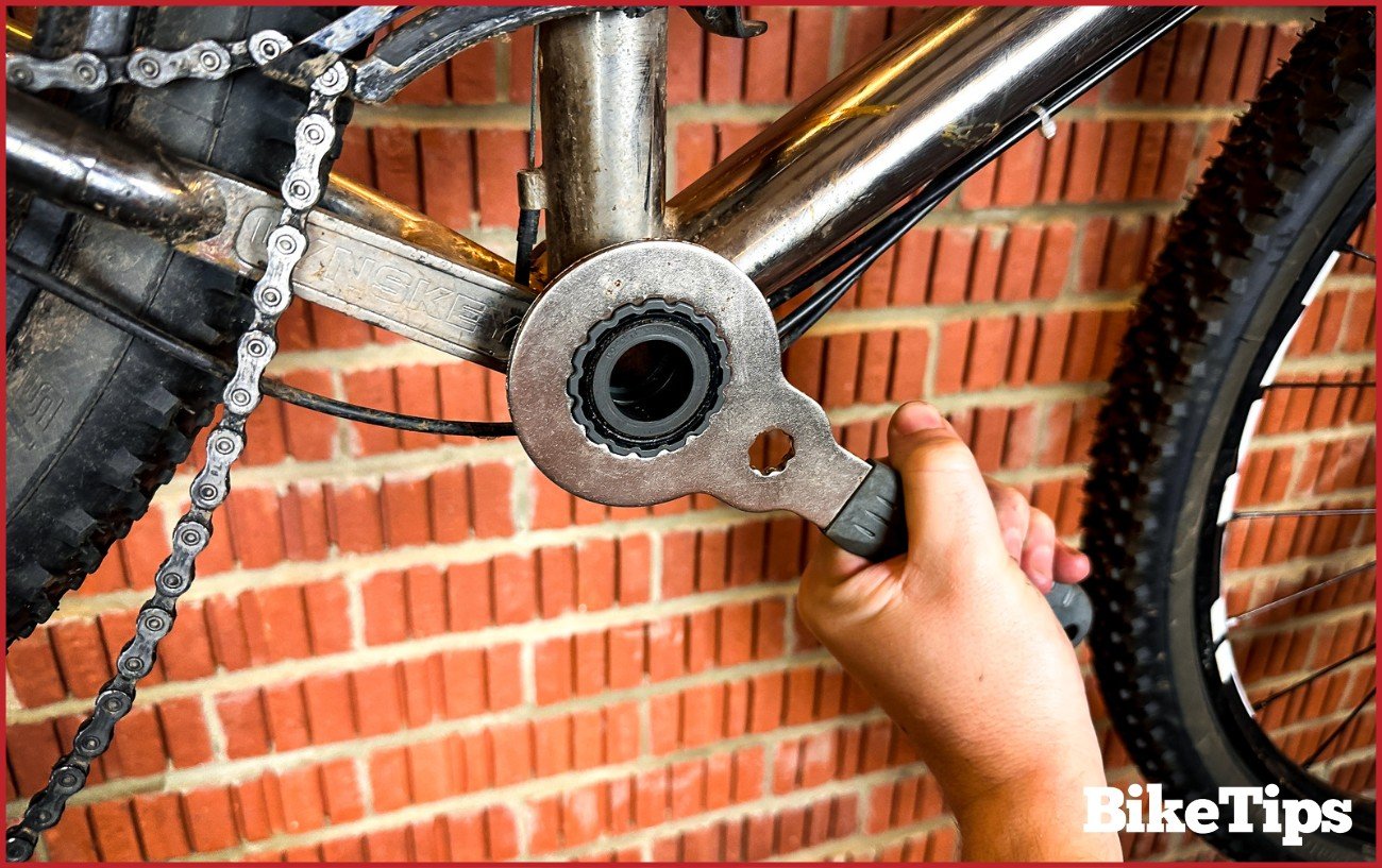 Removing the bottom bracket from the bottom bracket shell.