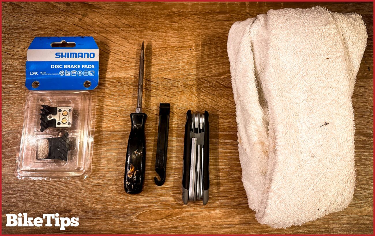 View of the equipment required to replace disc brake pads.
