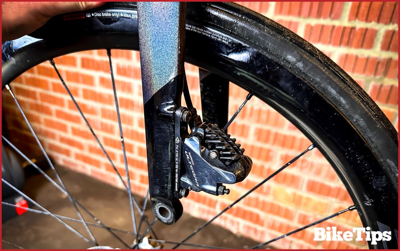Removing the wheel from the frame.