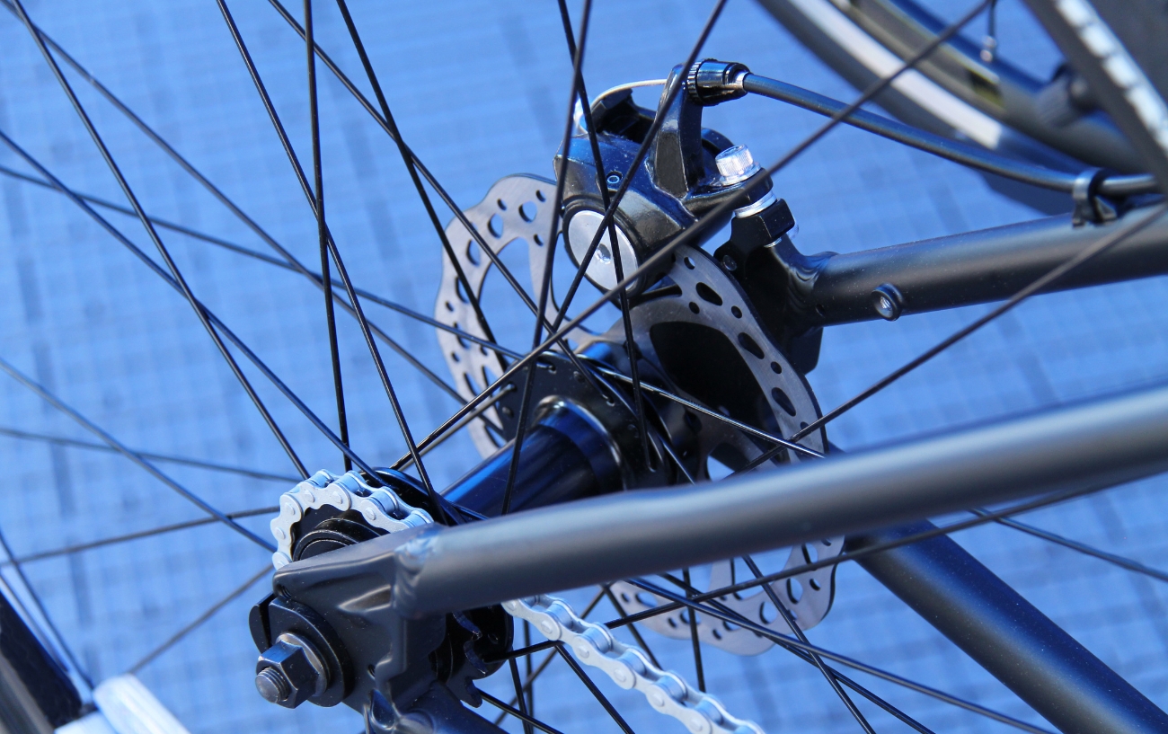 Disc brake caliper and rotor from above.