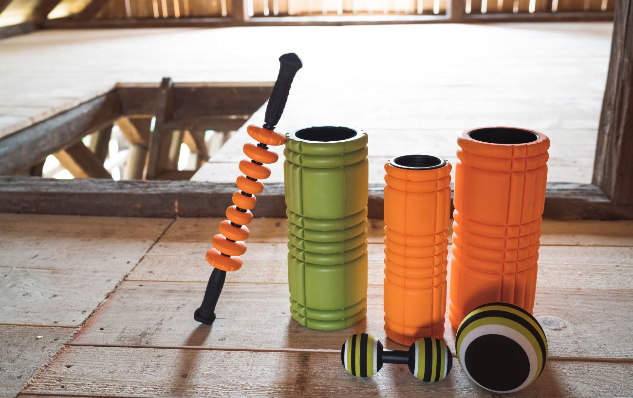 A selection of foam rollers of varying sizes and styles.