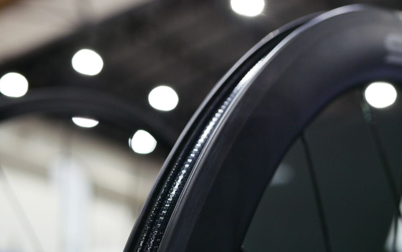 Close-up of a deep-section bike wheel rim.