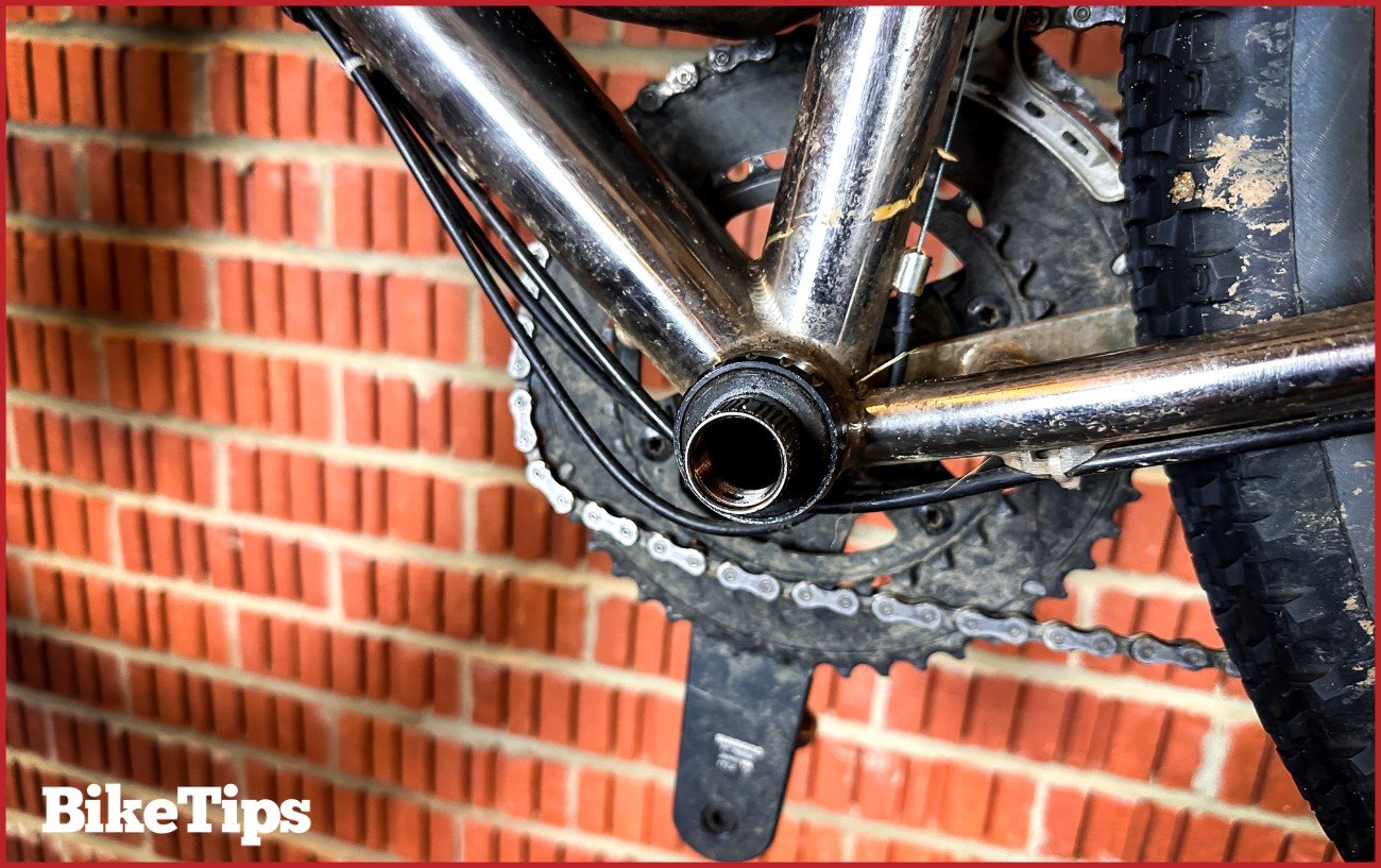 The bottom bracket is exposed after removing the crank arm.