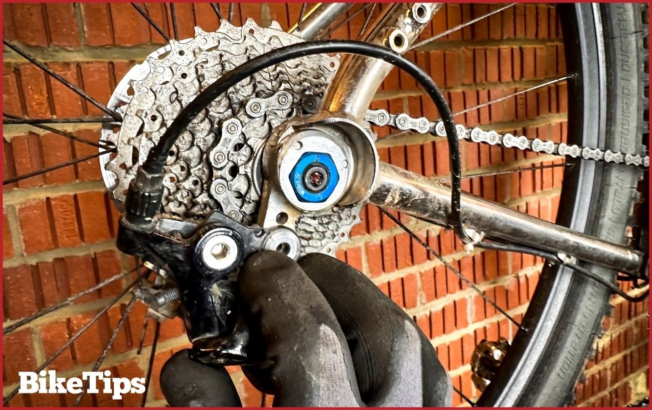 Checking whether the derailleur hanger is bent.