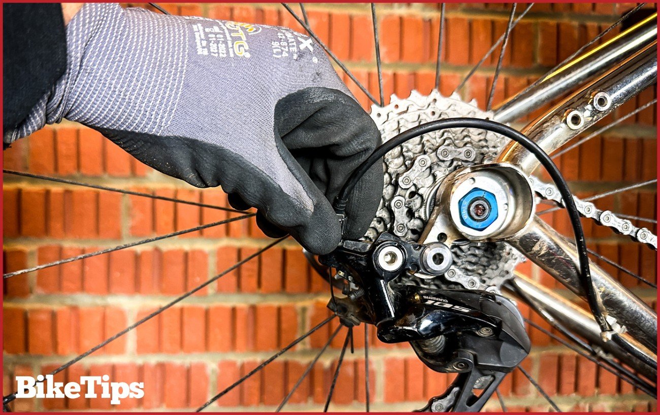 Using a barrel adjuster to index the gears of a gravel bike.