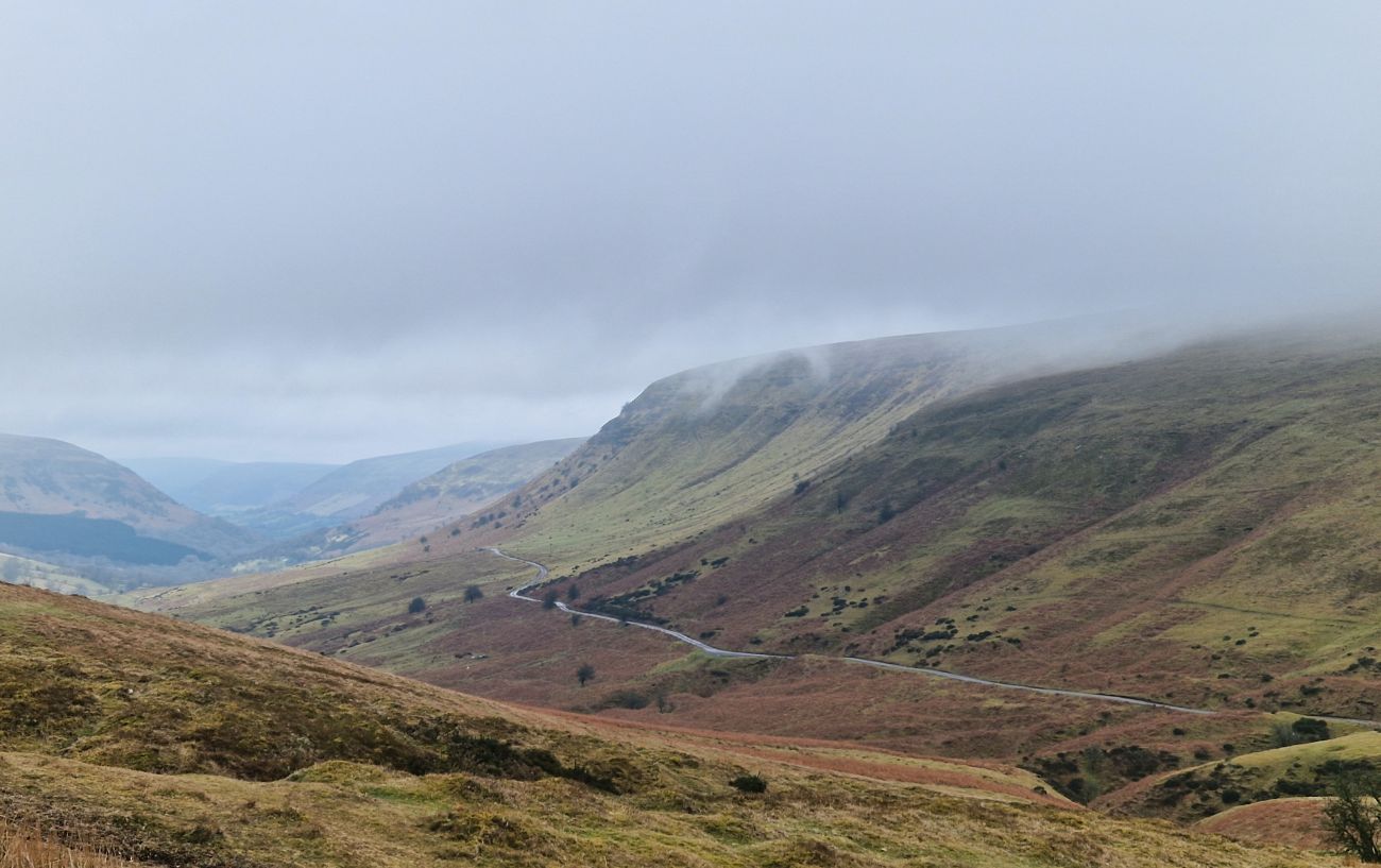The cloud-covered valley containing Gospel Pass.