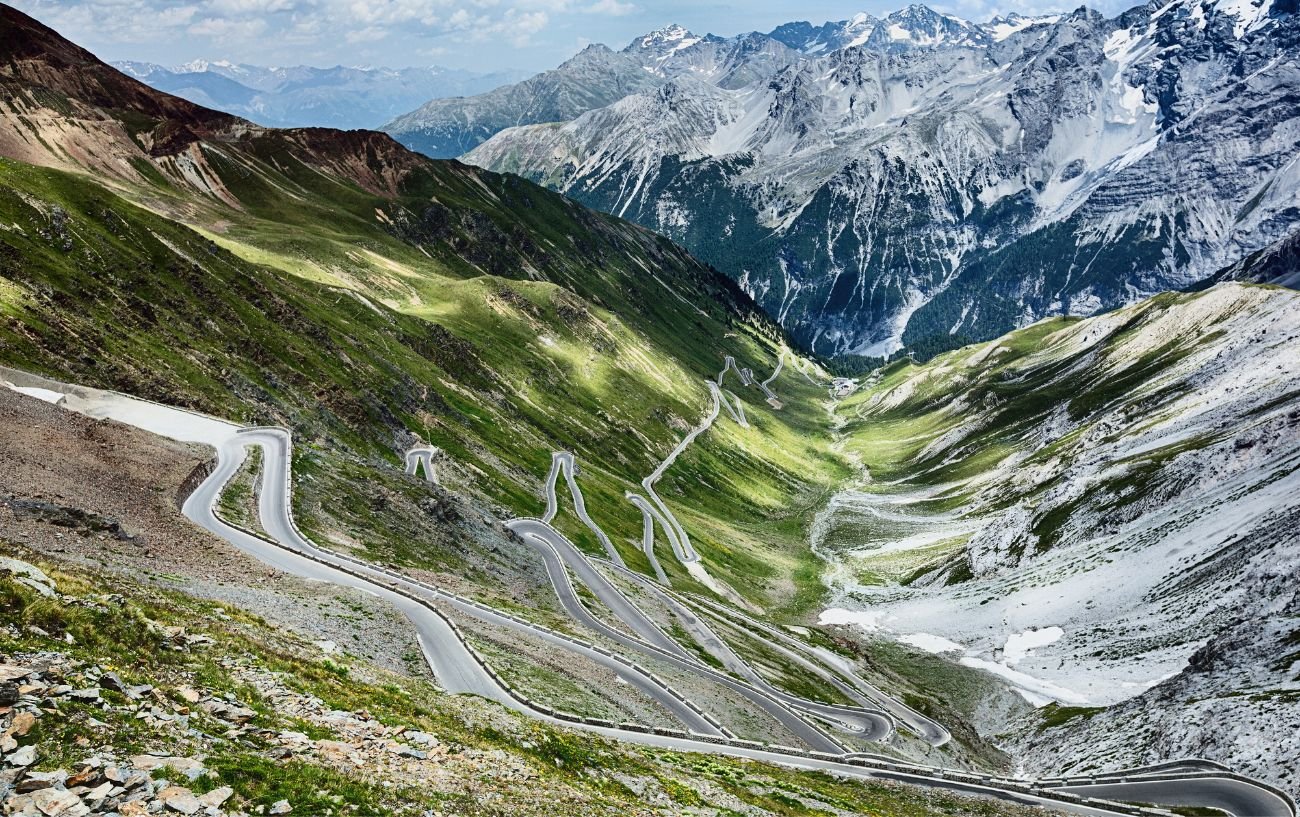 The road snakes down from the Passo dello Stelvio.