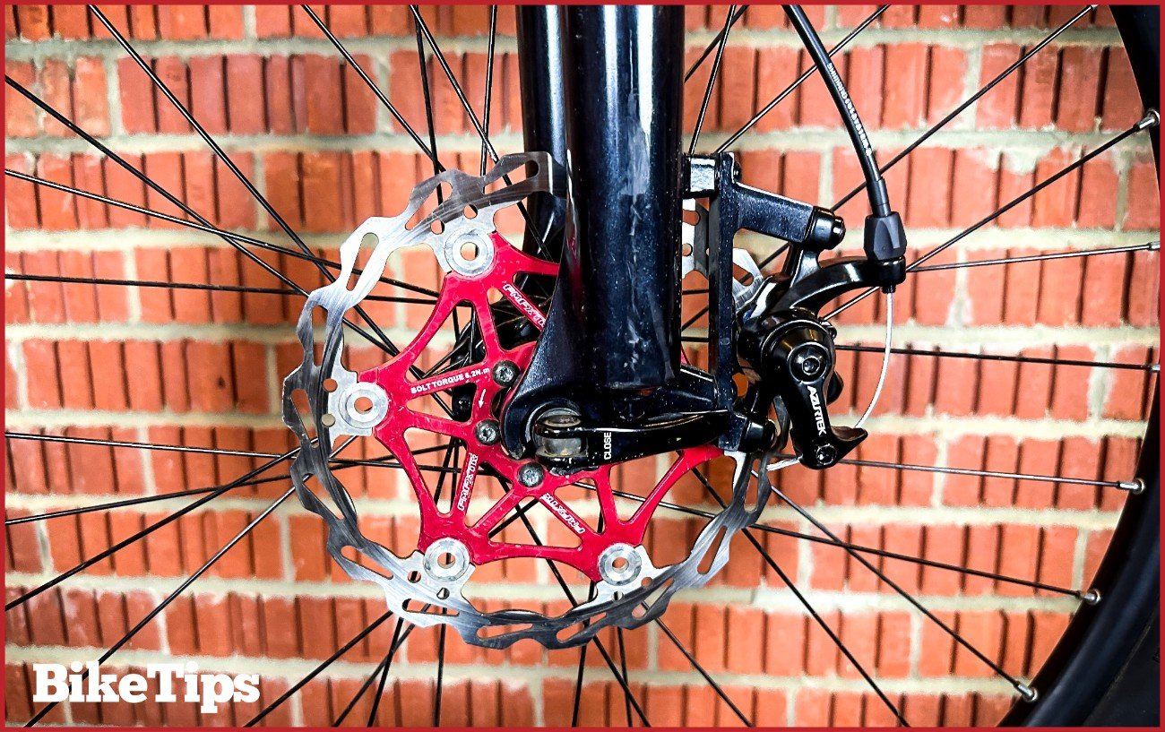 A mechanical disc brake on a mountain bike suspension fork.