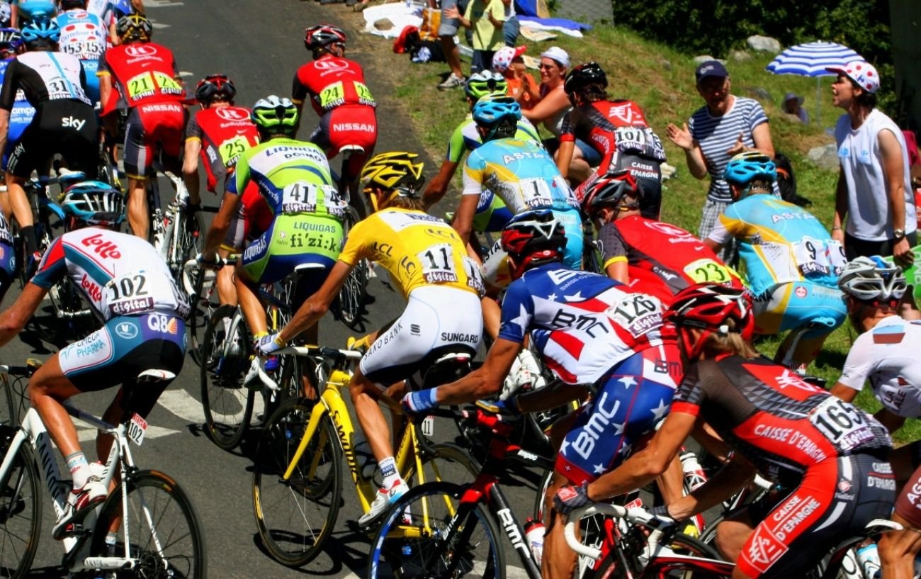 The peloton climbs a hill in the Tour de France.