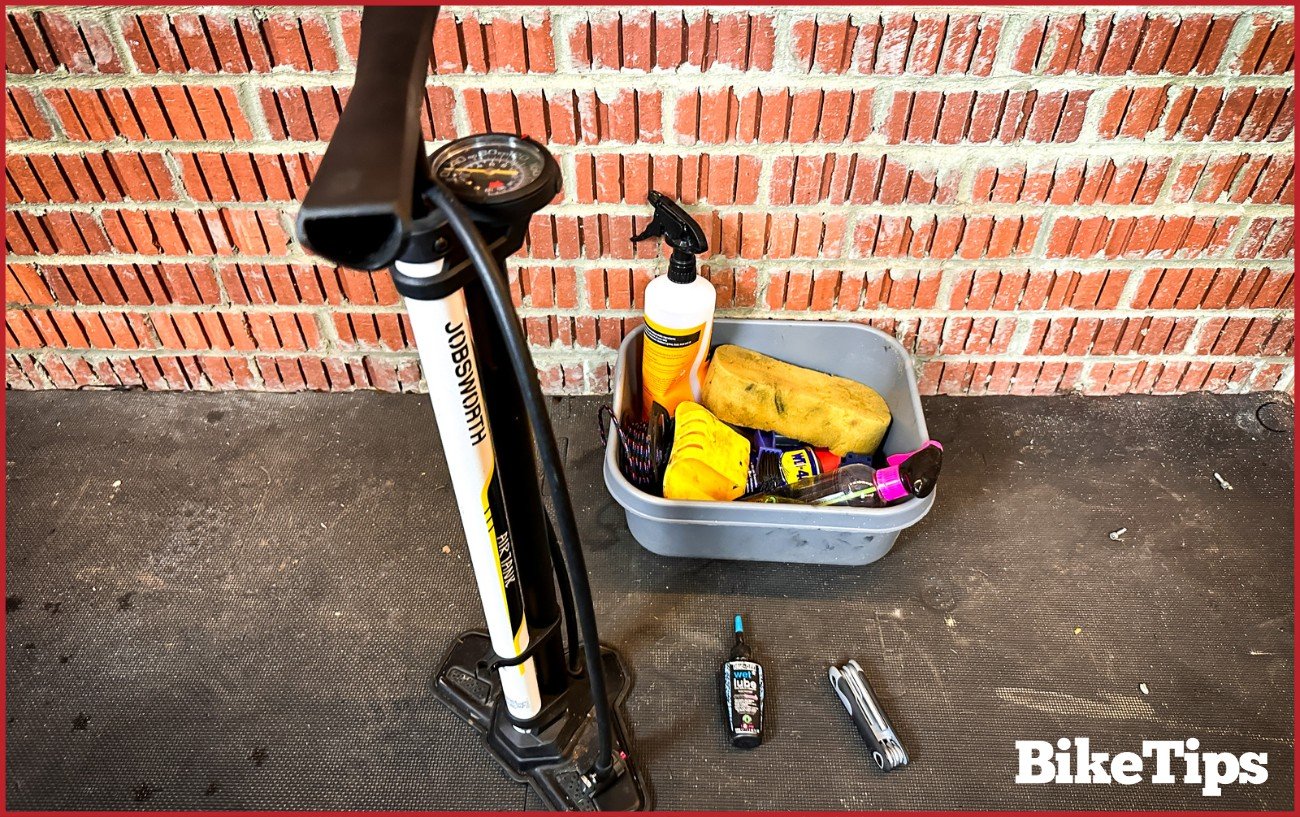 A kit to wash a bike alongside a pump, bike lube, and an Allen key set.