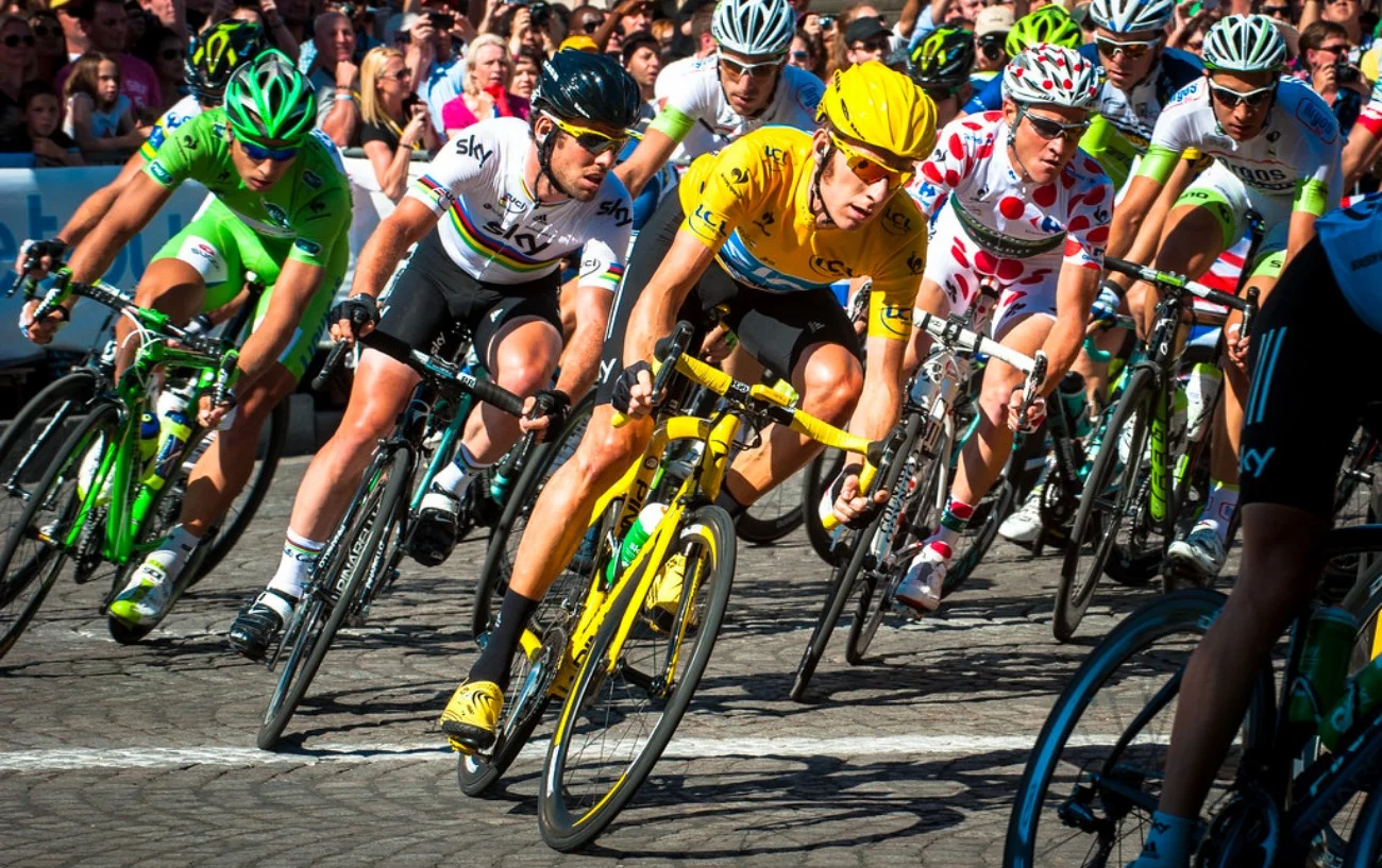 Left-to-right: Peter Sagan in the Green Jersey; Mark Cavendish in the Rainbow Jersey; Bradley Wiggins in the Yellow Jersey; and Thomas Voeckler in the Polka Dot Jersey.