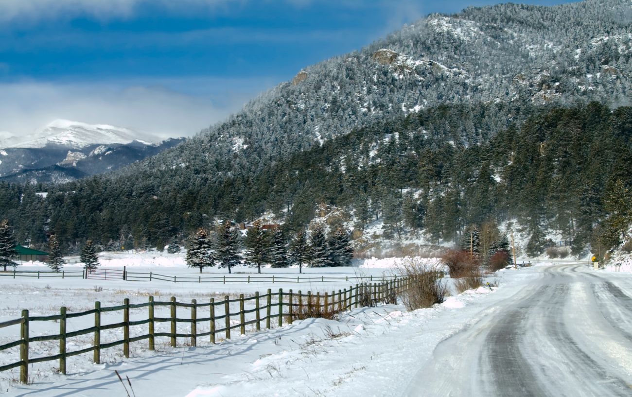 Towards the foot of Mount Evans, the road is covered in snow in winter.
