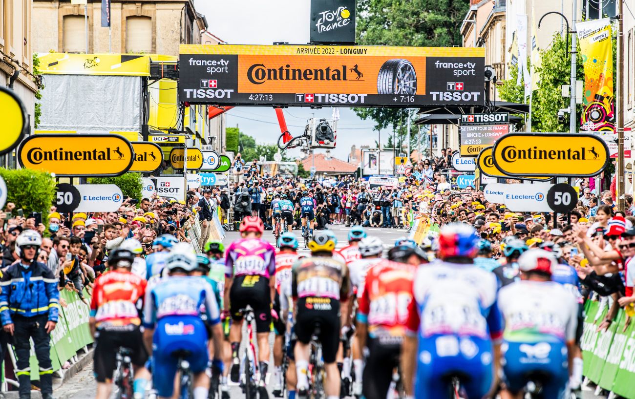The peloton approach the finish line at the Tour de France.
