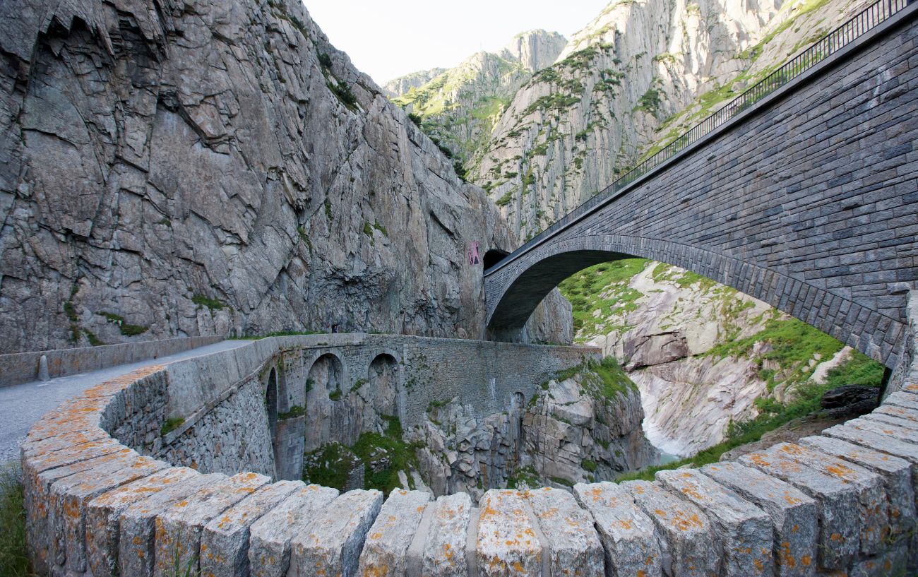 Cobbled bridges and tunnels intertwine on St Gotthard Pass Switzerland.