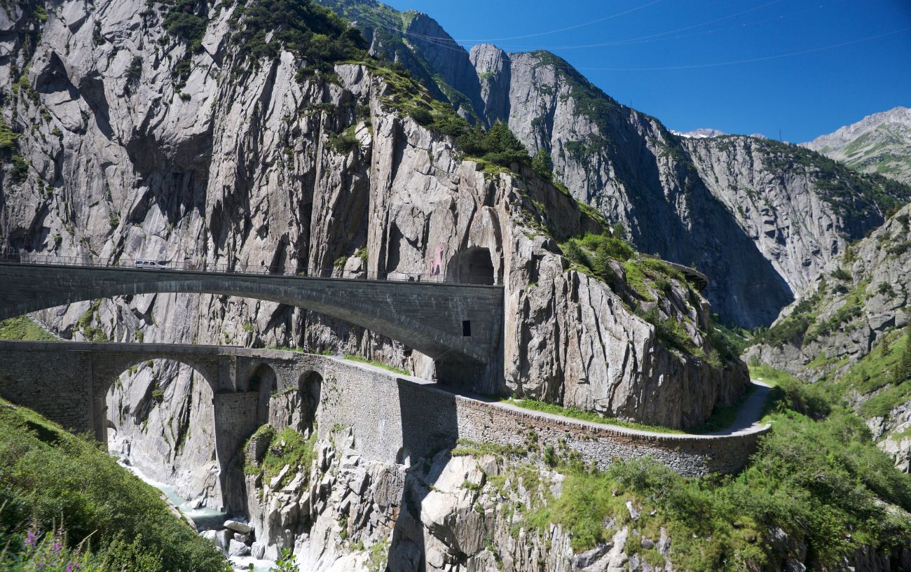 The road of St Gotthard Pass is carved into the Swiss cliffs.