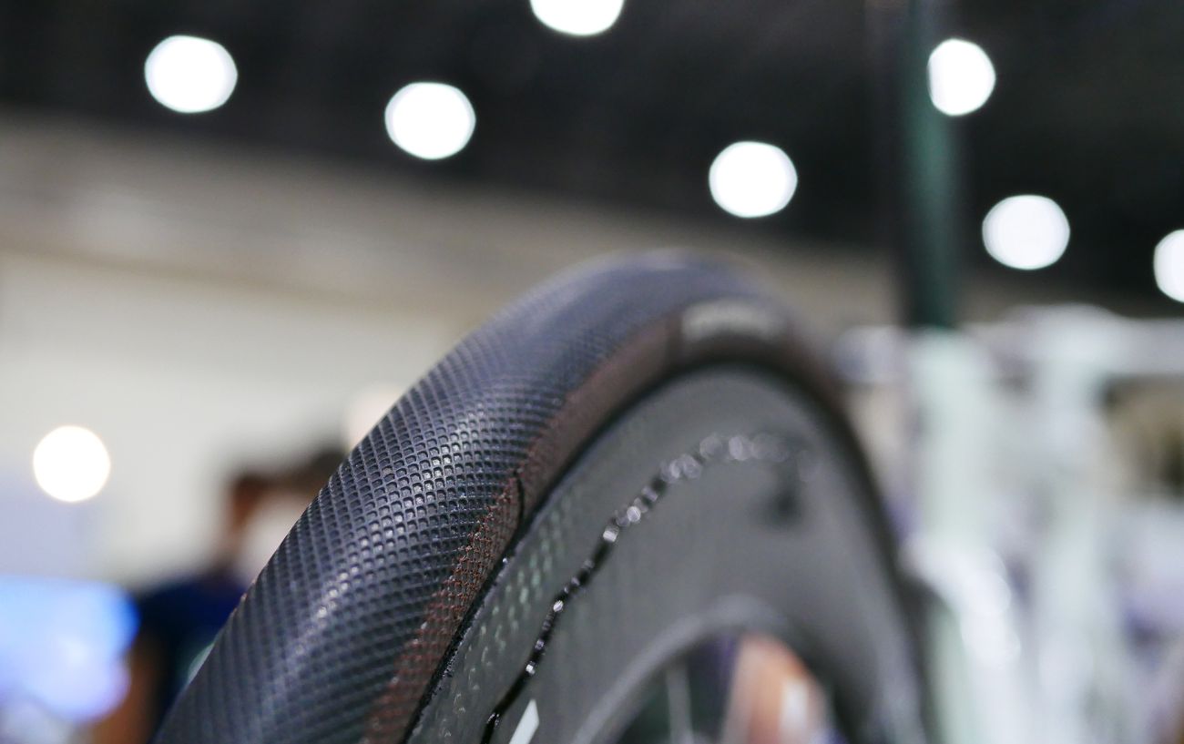 A road bike wheel with new tyres and a deep rim set.