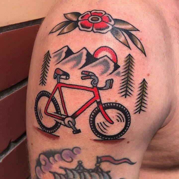 traditional mountain bicycle tattoo with color