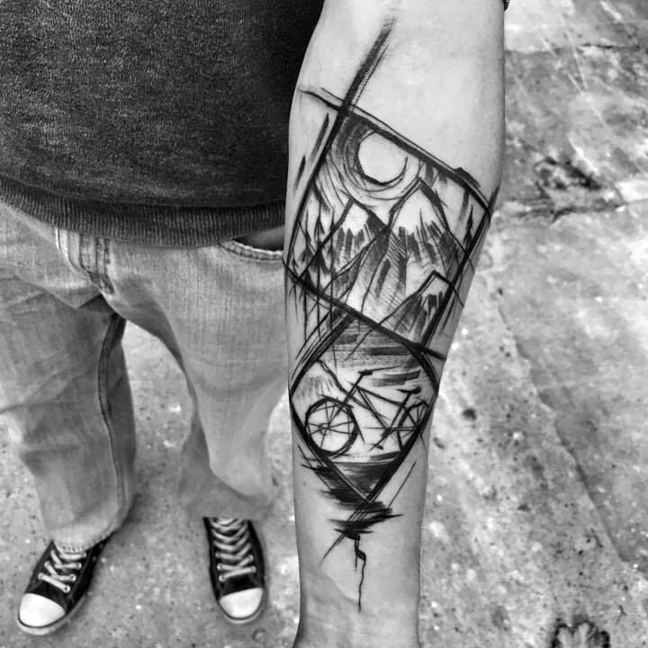 sketch-style mountain trail bicycle tattoo