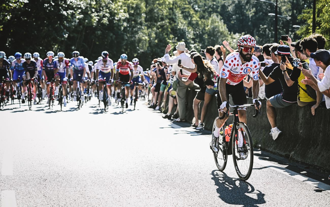 A cyclist in the polka dot jersey for the King of the Mountains at the Tour de France.