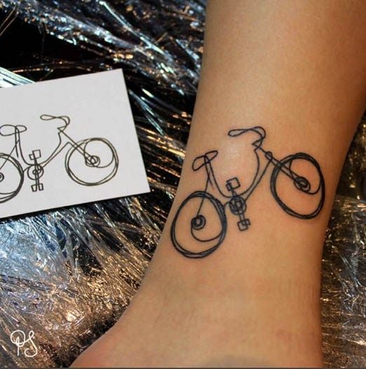 one continuous line silhouette bicycle tattoo