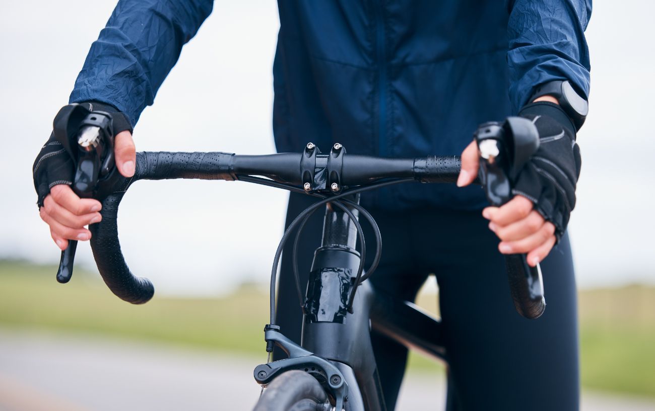 Brifters on a black road bike.