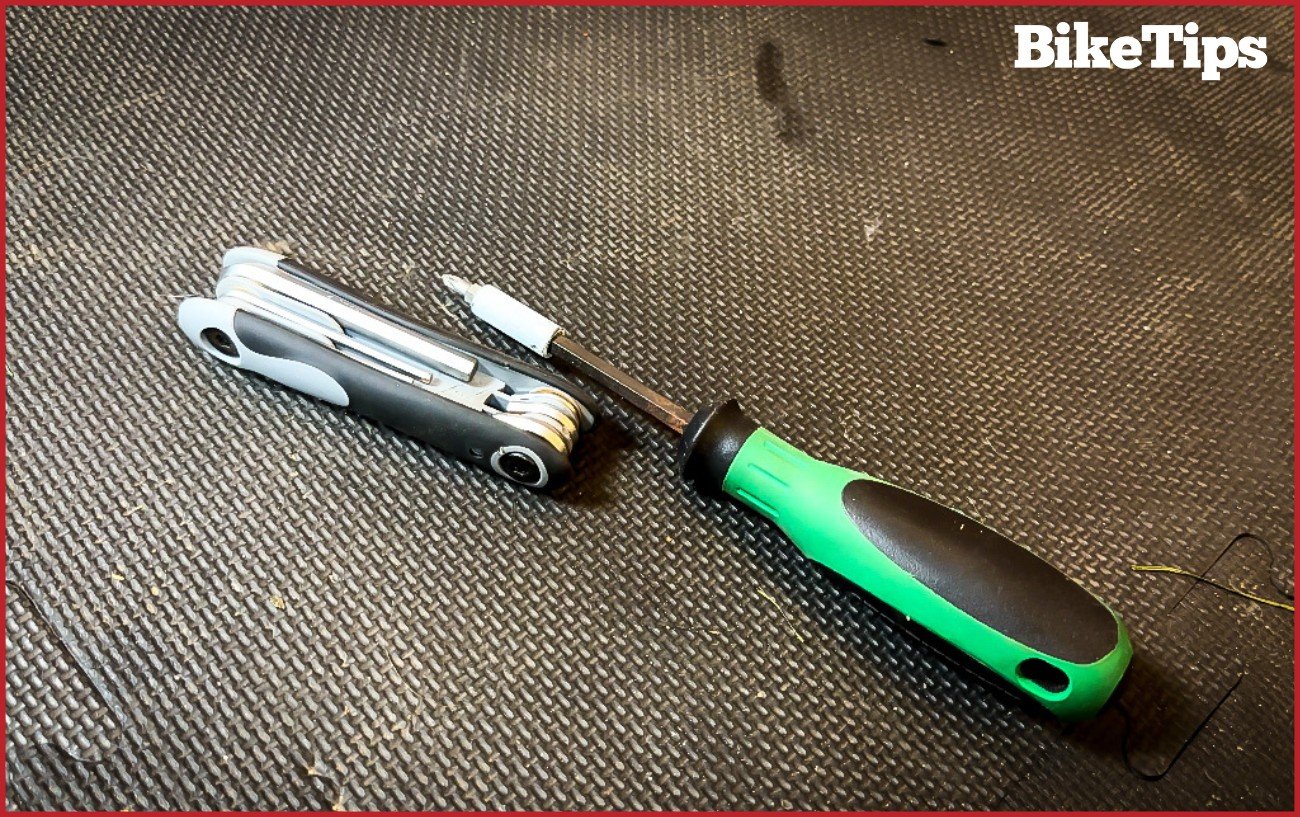 An Allen key set and a Phillips screwdriver.