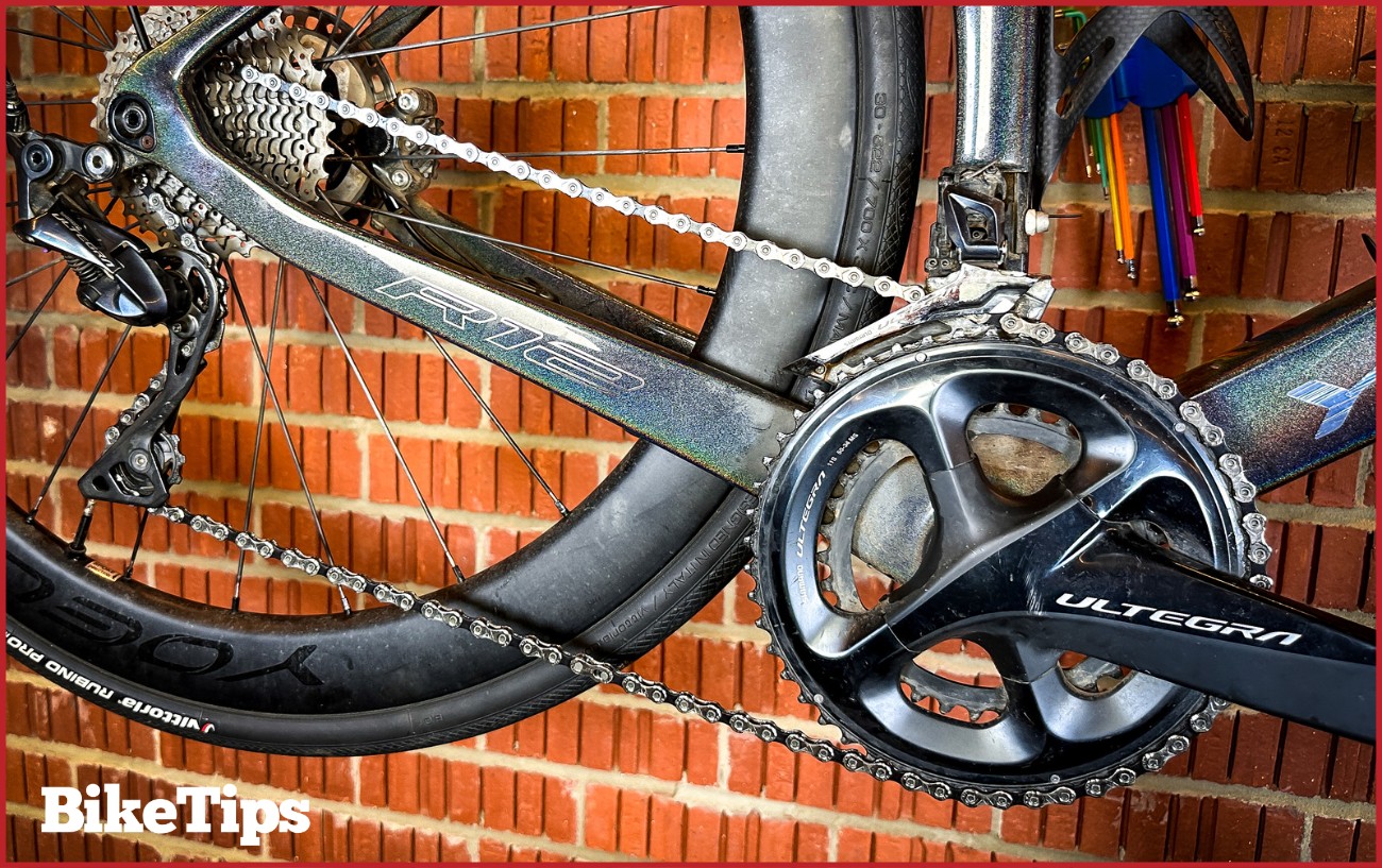 A Shimano Ultegra groupset with the bike in the stand and tools in the background.