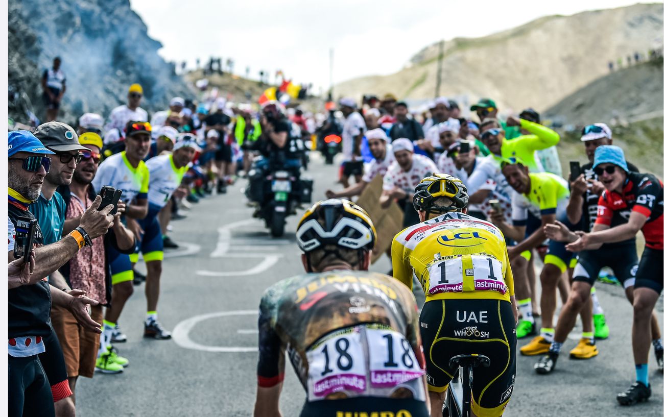 Vingegaard and Pogacar going up a climb on Stage 11 of the Tour de France 2022.