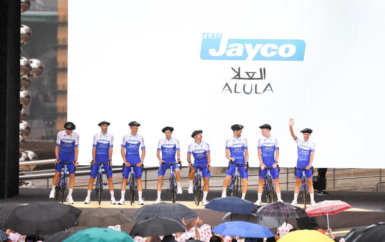 Team Jayco-AlUla line up at the 2023 Tour de France Team Presentation.