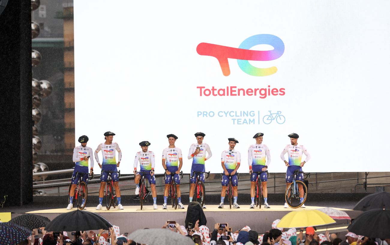 Team TotalEnergies line up at the 2023 Tour de France Team Presentation.