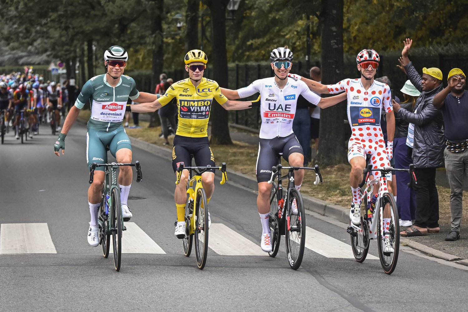 The four jersey winners of the 2023 Tour de France celebrate on Stage 21.